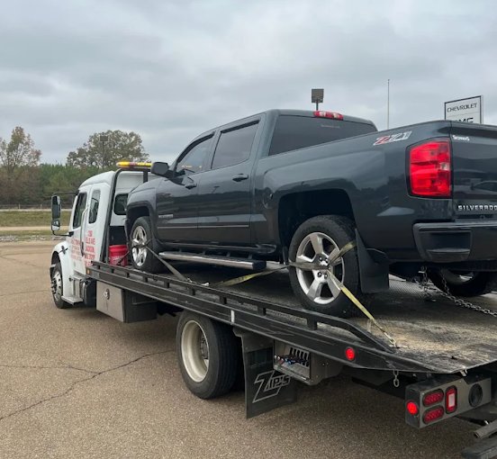 Chevy Silverado being towed by A to Z